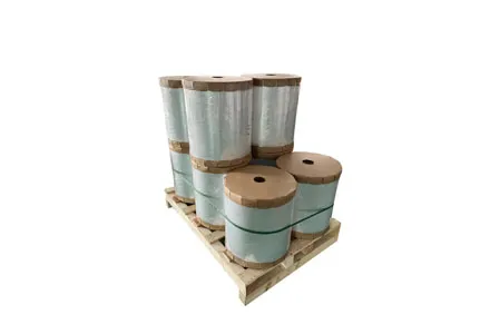 What are the definitions of tensile strength and elongation at break for plastic films?
